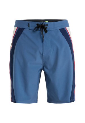 Blue swim shorts with black drawstring, featuring side panels in navy and white, accented by red stripes, made from lightweight material.