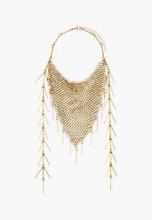 Złoty naszyjnik łańcuszkowy o trójkątnym wzorze siatkowym. Posiada wydłużone, spiczaste akcenty zwisające z krawędzi. Teksturowane i błyszczące wykończenie.