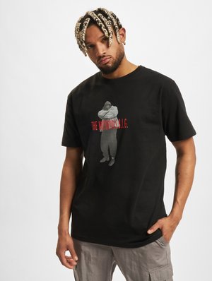 Black cotton t-shirt featuring a gray graphic of a figure with red text reading "THE NOTORIOUS B.I.G." on the front. Short sleeves.