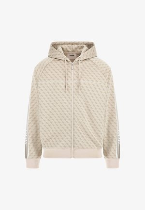 Beige zip-hoody med geometrisk mønster, snoretræk i hætten og hvide sidelister. Har ribbede manchetter og bund. Blød stoftekstur.