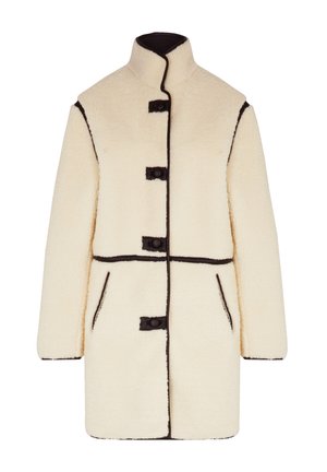 Cremefarbener Fleece-Mantel mit hohem Kragen, schwarzem Besatz, drei schwarzen Knöpfen und zwei Seitentaschen. Weicher Stoff, gradliniger Schnitt.