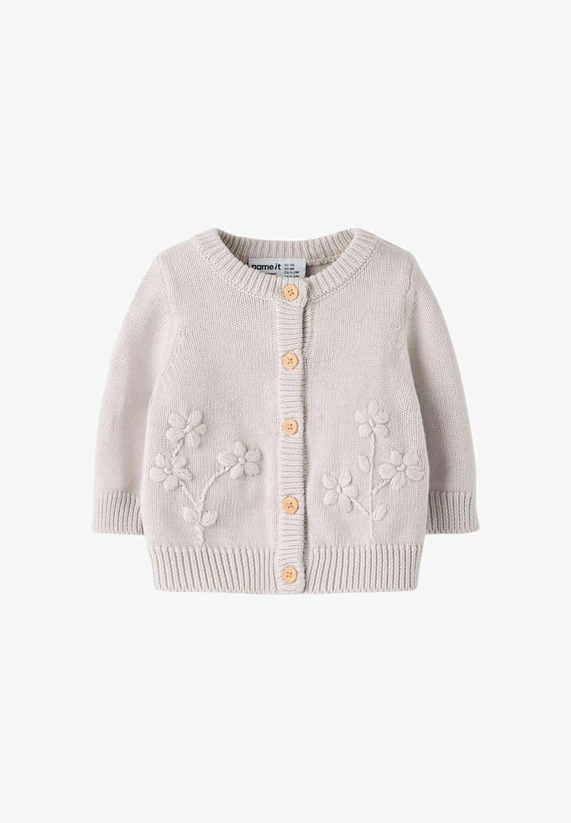 Cardigan lavorato a maglia grigio chiaro con maniche lunghe, scollo rotondo, bottoni in legno e ricamo floreale sul davanti. Polsini e orlo a coste strutturati.