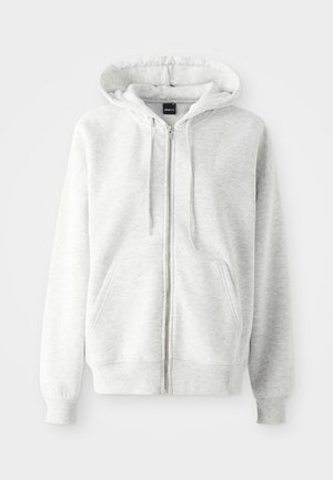 Sweatshirt cinzenta com fecho éclair, feita de um tecido macio e texturizado. Apresenta um capuz com cordão, bolsos frontais e punhos e barra canelados.