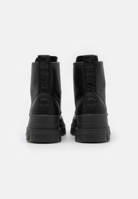 Buffalo Bottines à plateau - black