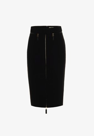 Gonna a tubino nera in tessuto liscio, con cerniera centrale in metallo dorato e dettagli con frange nere; lunghezza fino al ginocchio.
