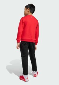 adidas Sportswear DISNEY MICKEY MOUSE SET UNISEX czerwony