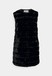 Svart väst i fuskpäls med ärmlös design, med en kviltad textur och vertikala rader. Enkla, rena linjer utan ytterligare dekorationer.