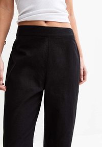 Fuseau et pantalon urbain femme
