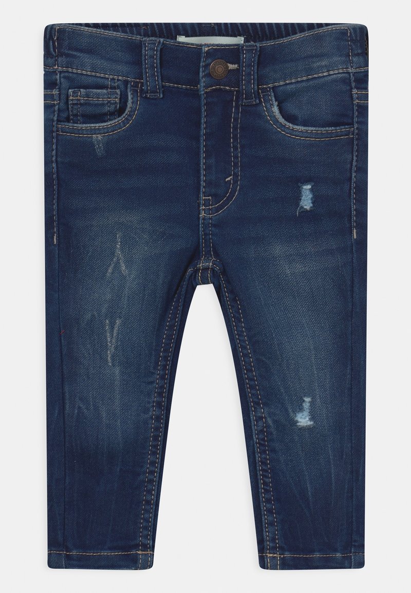 Tmavé džíny z denimu s vybledlým wash efektem, s opotřebovanými detaily, předními kapsami a klasickým pětikapsovým designem. Mají zapínání na knoflík a poutka na pásek.