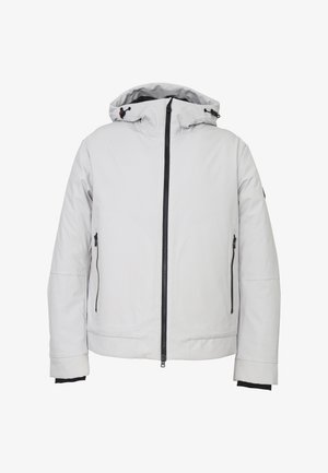 Giacca isolante grigio chiaro con cappuccio, zip nera e due tasche laterali con zip. Presenta polsini elasticizzati e una texture liscia e opaca.