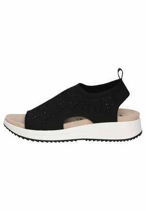 Musthave must avatud varvastega sandaalid, millel on kudumine ülemine osa, külgmised lõiked ja valge vaheosa. Tekstuuriga välistald, mis tagab haarde. Kandmisel tõmbeese.