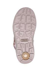 Różowa guma na podeszwie buta z fakturowanym wzorem bieżnika, z detalami logo oraz okrągłym wkładem pochłaniającym wstrząsy na pięcie.