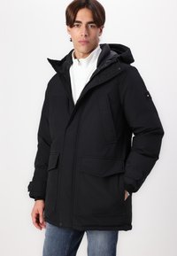 Tommy Hilfiger ROCKIE  - Piumino lungo - black