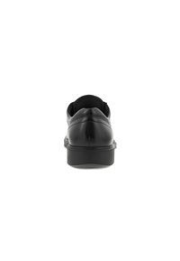 Chaussures en cuir noir avec une texture lisse, bout rond et talon bas ; présentent des coutures minimales et un col rembourré pour le confort.