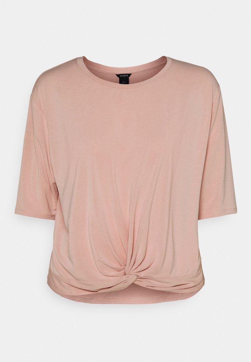 Camiseta de manga corta de color rosa claro, cuello redondo, detalle de nudo delantero en el dobladillo, confeccionada con tela suave y lisa, con un ajuste relajado.
