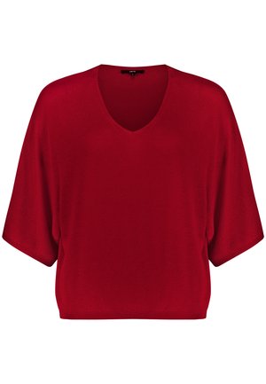 Rood gebreid topje met korte mouwen, V-hals en losse pasvorm, met een geribbelde zoom en zonder zichtbare patronen of versieringen.