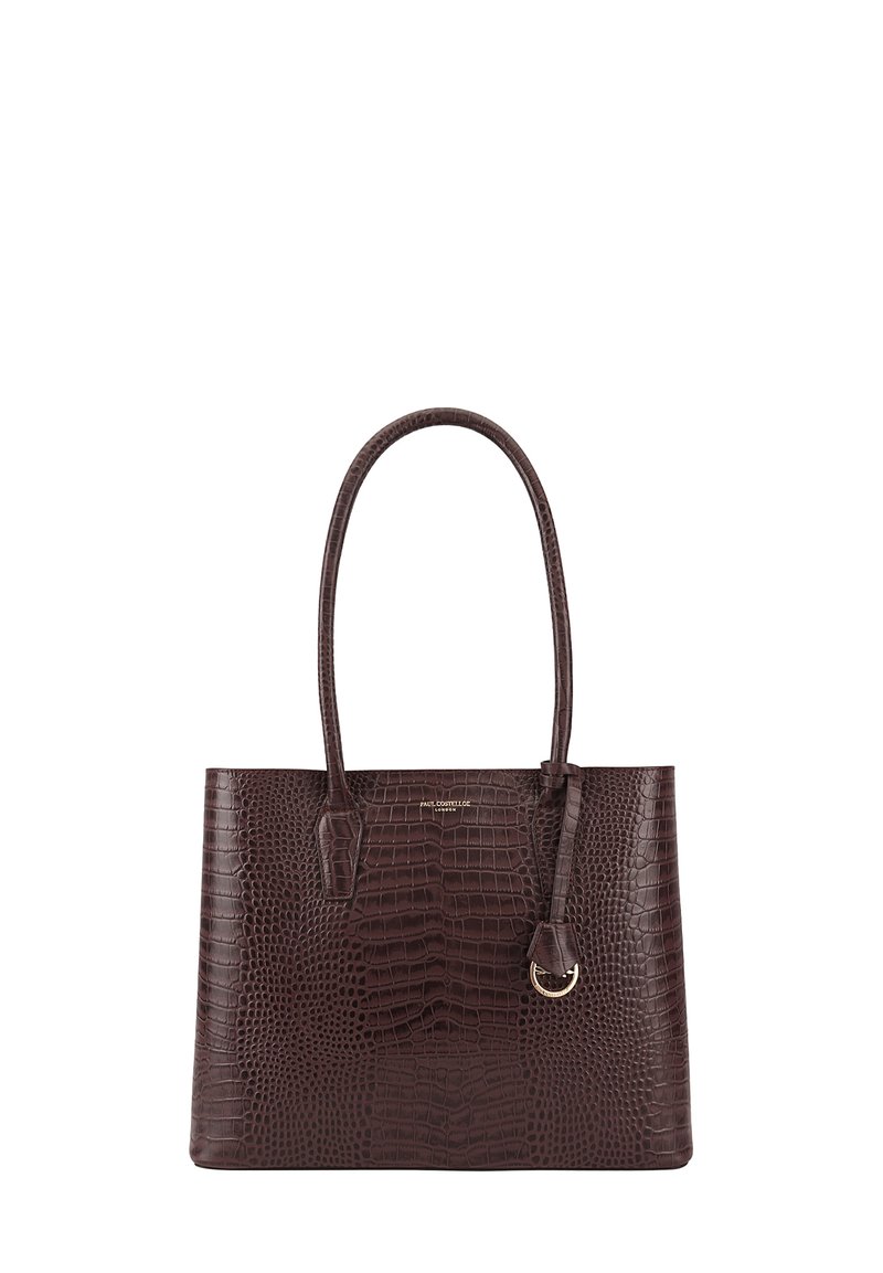 Bruine krokodil-embossed tote bag met twee handvatten en een gouden ringaccent. Heeft een gestructureerd ontwerp en een gladde textuur.