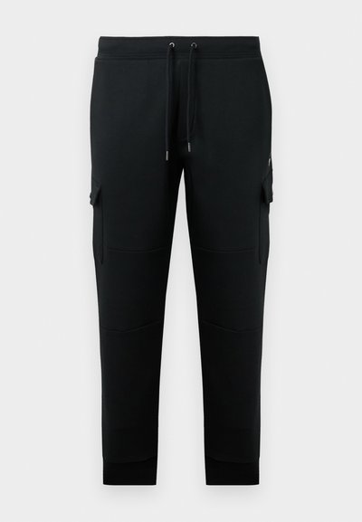 Pantaloni de trening negri, dintr-un material moale, cu un talie elastică dotată cu șnururi, manșete cu nervuri și buzunare laterale tip cargo.