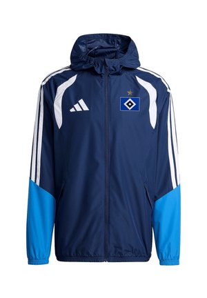 Veste de sport bleu marine avec capuche, logo Adidas blanc et bandes, parties des manches bleu clair, et un emblème en forme de losange bleu et blanc avec une étoile dorée.
