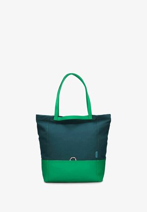 Bolsa de tela con un cuerpo de lienzo verde oscuro y un fondo verde brillante. Cuenta con dos asas a juego y un pequeño acento de metal en la parte delantera.
