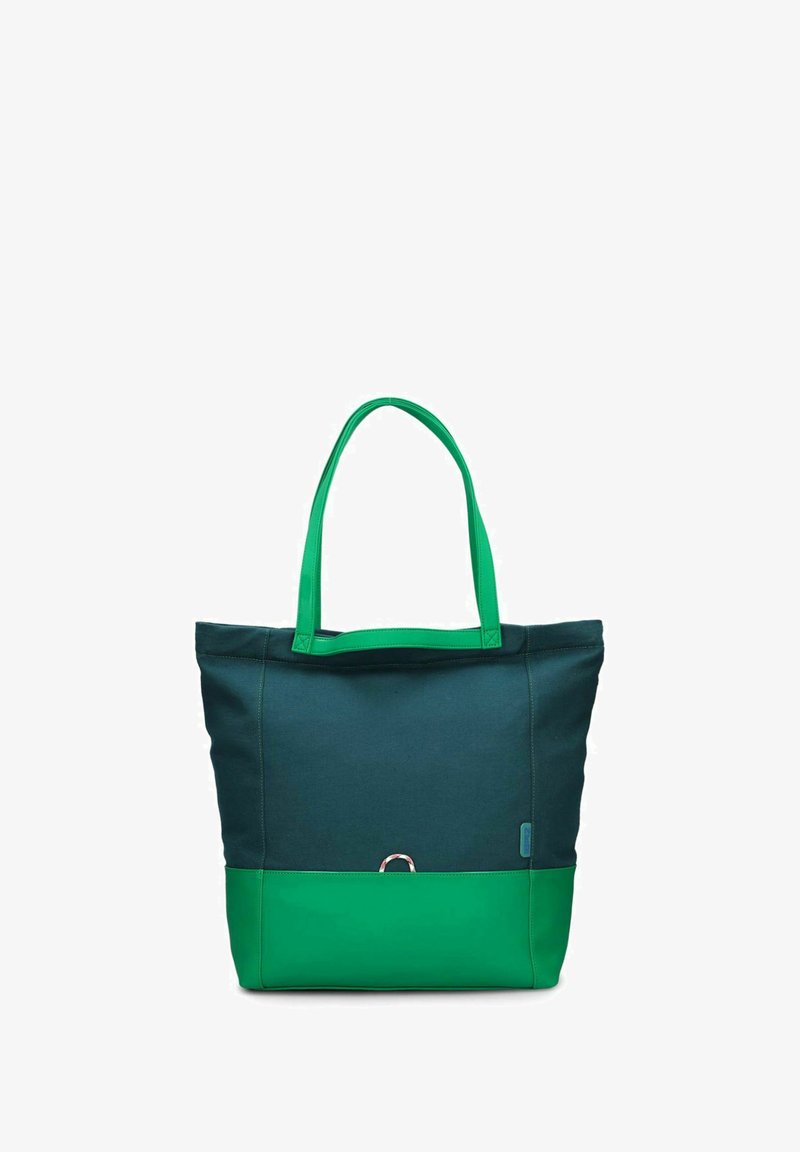 Sac fourre-tout avec un corps en toile vert foncé et un fond vert vif. Présente deux poignées assorties et un petit accent en métal à l'avant.