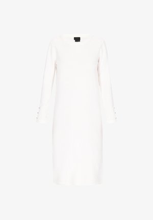 Valge, pika varrukaga kleit ümmarguse kaelusega, tekstuuriga kangas ja dekoratiivsed kuldsed nööbid mansettidel. Lihtne, põlvekohale ulatuv disain.