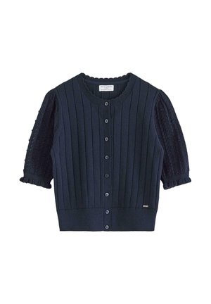Marinblå cardigan med ribbat framstycke, spets puffärmar och rundad halsringning. Funktioner knappstängning och accent vid fållen.