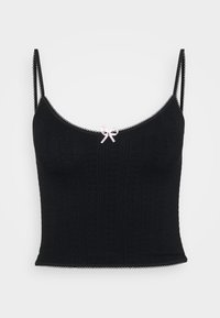 Camisole noire en maille avec fines bretelles, ourlet festonné et petit nœud en satin rose au centre devant. Motif texturé sur toute la surface.