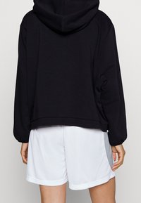 Nike Performance Jersey con capucha - black