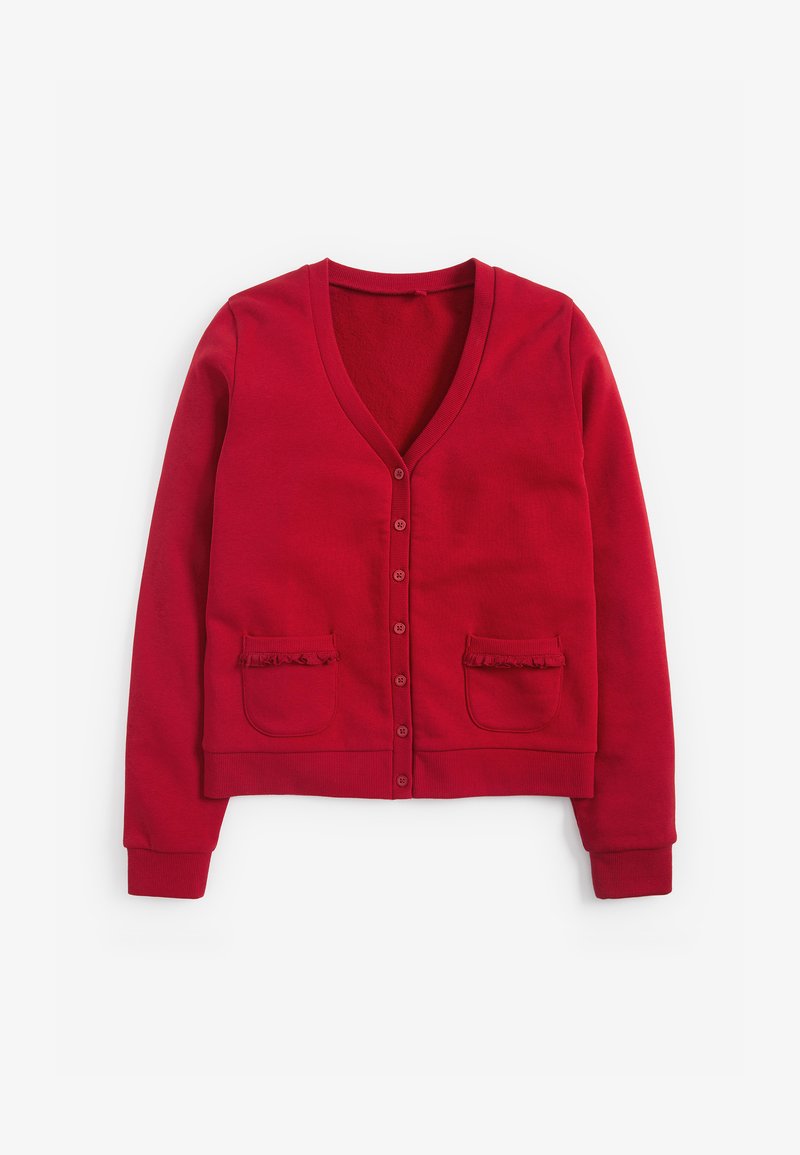 Red cardigan with a V-neck, button closure, and two front pockets featuring ruffled edges. Made from soft, textured fabric.