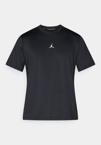 Μαύρο κοντομάνικο T-shirt από απαλό ύφασμα, με λευκό λογότυπο Jumpman στο κέντρο του στήθους. Απλή σχεδίαση με στρογγυλή λαιμόκοψη.