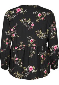 Blusa nera con motivo floreale in rosa e verde. Presenta maniche lunghe, vita peplum e polsini arricciati. Tessuto leggero con una finitura strutturata.