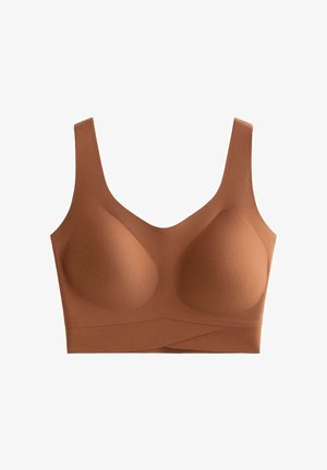 Bruine naadloze bralette met brede banden, gevormde cups en een kruislijnontwerp aan de onderrand, gemaakt van een zachte, rekbare stof.