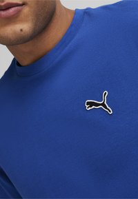 Puma BETTER ESSENTIALS TEE - T-shirts basic - glaze