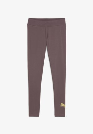 Lieknos mauve spalvos legginsai su plačiu juosmeniu ir mažuoju auksiniu liūto logotipu šalia kairiojo kulkšnies, išdėstyti ant baltos fono.