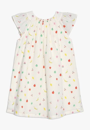 Robe blanche en coton avec manches courtes volantées, ornée d'un imprimé coloré de fruits et de formes. Encolure froncée, coupe ample, longueur au genou.