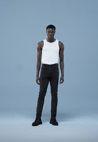Levi's® 515 SLIM TAPER - Blugi slim fit - snap back