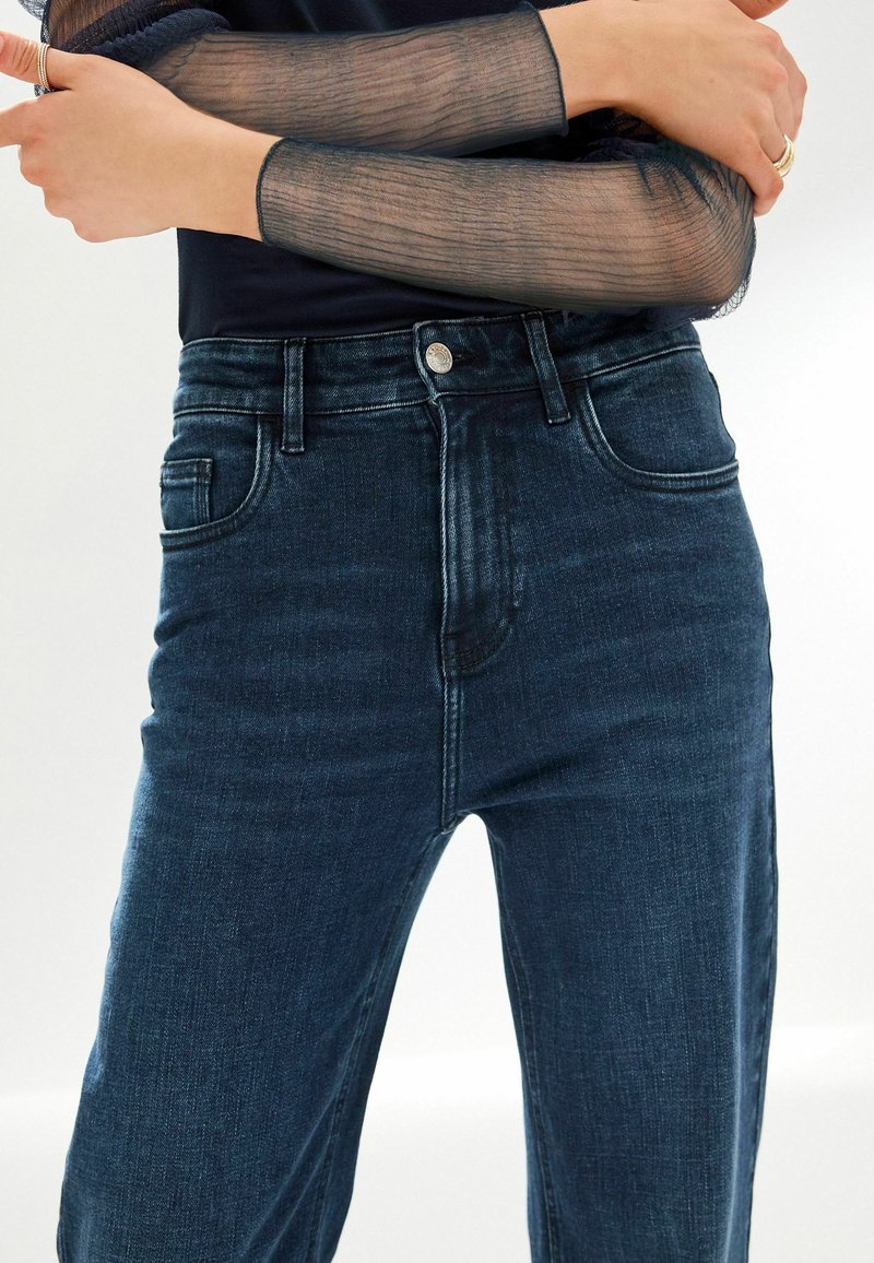Jean Femme NEXT Bootcut Délavé Bleu Foncé - Taille 12 - Longueur De Jambe 30 - Occasion TB