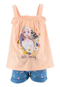 Canotta color pesco chiaro con scollatura elastica, caratterizzata da una grafica floreale e la scritta "Ciao primavera". Abbinata a pantaloni corti blu decorati con piccoli fiori.