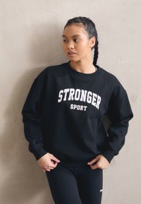 Stronger COMFY  - Pusa - black