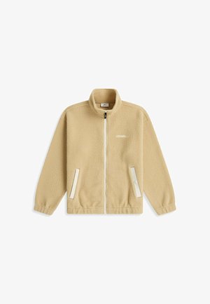 Beige fleecejakke med fuld lynlås, ståkrave, to frontlommer, elastiske manchetter og kant samt lille hvidt logo på venstre bryst.