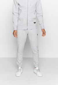 Björn Borg - CENTRE TAPERED PANTS - Donji dijelovi trenirke - light grey melange Minijatura 1