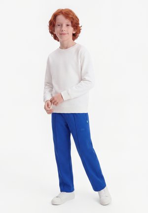 Nike Sportswear Παντελόνι φόρμας - game royal/volt