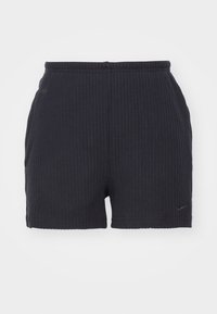 Dark blue ribbed shorts with an elastic waistband and a small Nike logo on the lower right side. Soft texture throughout.