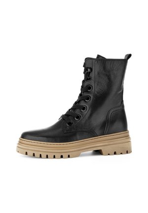 Black leather ankle boot featuring a lace-up design, beige rubber sole, textured stitching, and a pull tab at the back for easy wear.