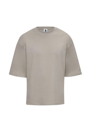 Kortærmet t-shirt med rund hals i lys beige bomuld. Har en afslappet pasform, glat tekstur og diskret branding på ærmet.