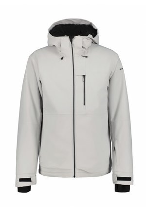 Chaqueta impermeable blanca con cierre frontal, capucha ajustable y forro de felpa negra. Presenta un bolsillo en el pecho y puños de velcro.