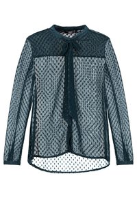 Blouse en voile teal avec des manches longues, un col haut et un détail à nouer à l'avant. Motif texturé de pois et de formes géométriques sur l'ensemble.