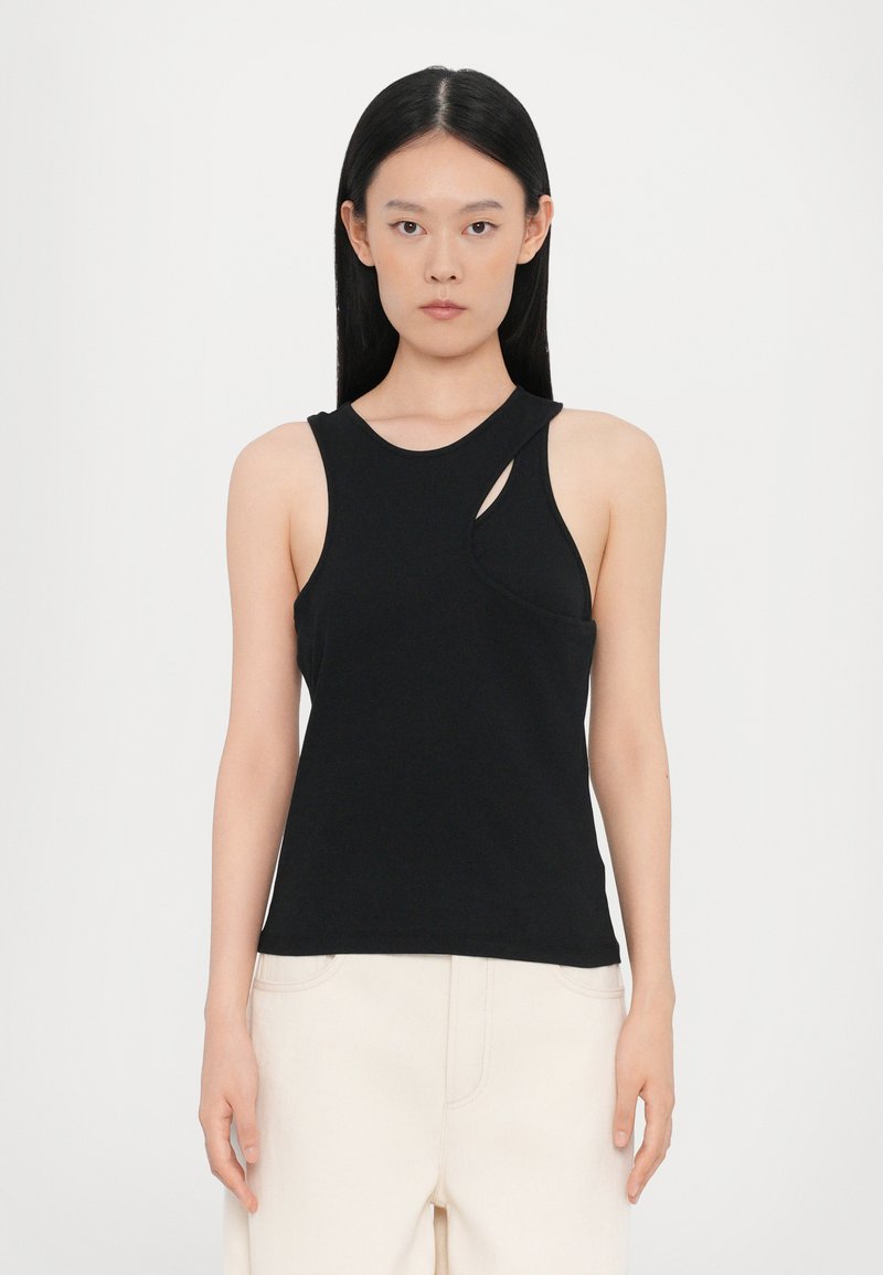 Black sleeveless top with a round neckline and asymmetric cutout detail on the left side, made from a soft fabric.