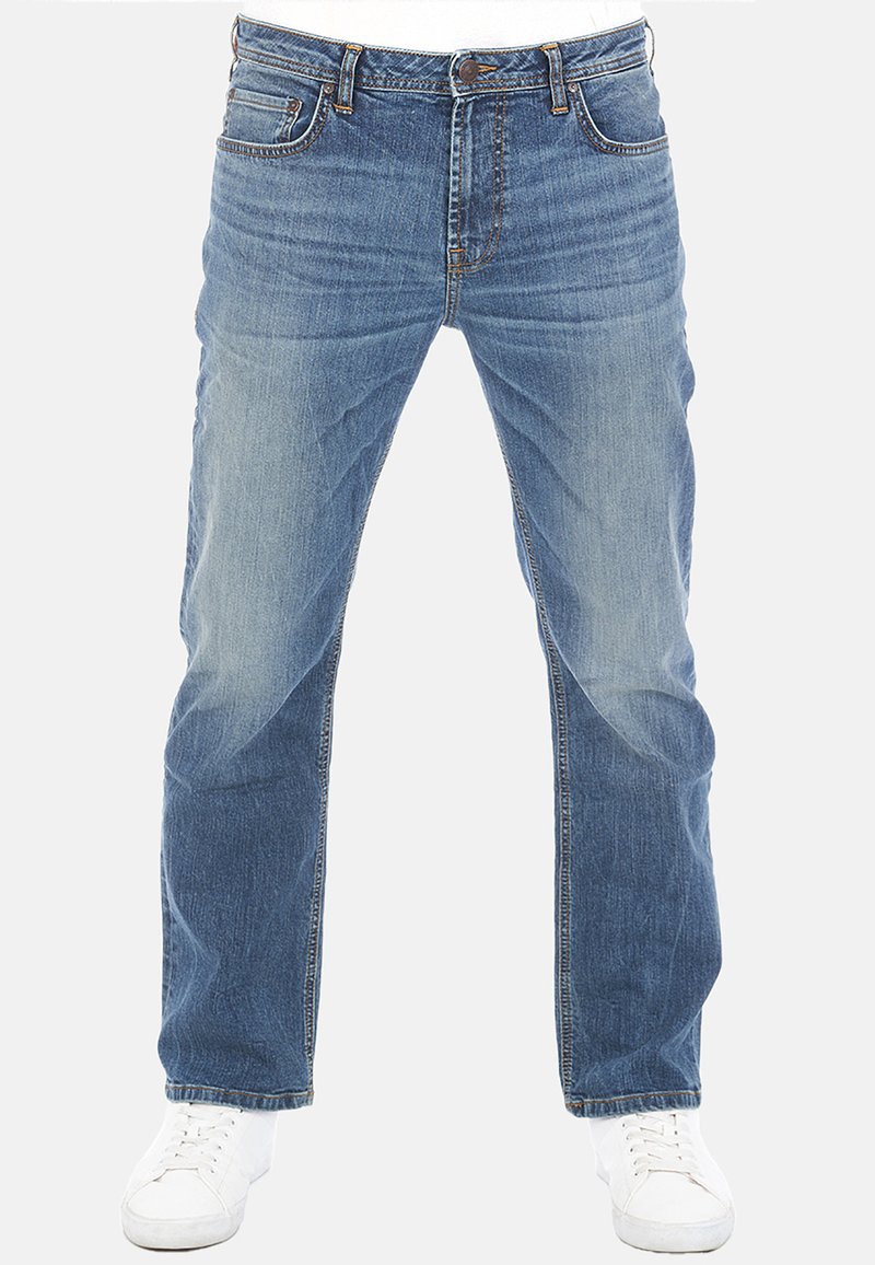 Jeans in denim azzurro chiaro con design a gamba dritta. Presentano sfumature sottili, stile a cinque tasche e cuciture a contrasto. Abbinate a scarpe bianche.